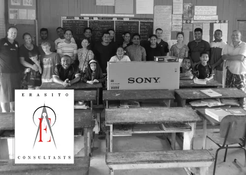 Erasito Consultants team donating a television to a primary school in Fiji